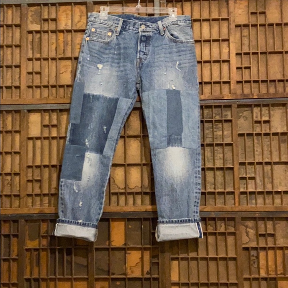 Distressed patchwork straight leg Levi’s jeans